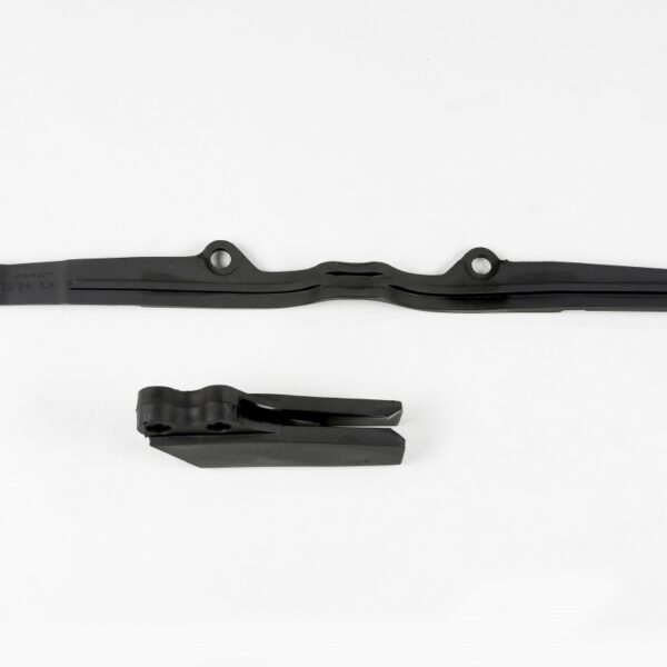 Komplet Ślizg (KA03703001) + Prowadnica (KA03708001) Łańcucha Kawasaki KX 125/250 ’97-’02 Kolor Czarny | UFO