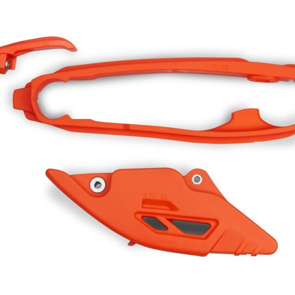 Komplet Ślizg + Prowadnica Łańcucha KTM SX 125 / 250 / 300 ’23-’25, SXF (SX-F) 250 / 350 / 450 ’23-’25, EXC 150 / 250 / 300 ’24-’25, EXCF (EXC-F) 350 / 450 / 500 ’24-’25 Kolor Pomarańczowy (KT05017001 + KT05018001) | UFO